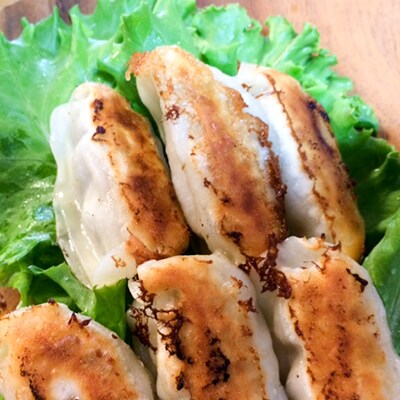沖縄市産 くいまーる豚焼肉・餃子2セット