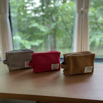 アルバートン社の帆布　アーミーダック　小物入れ　オレンジ