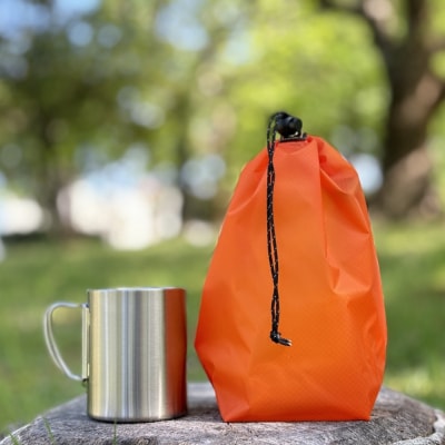 【S 1.5L・オレンジ】　キャンプで大活躍!トイレットペーパーホルダー 小さめナイロン巾着袋