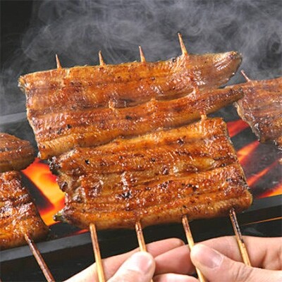 肉厚ふわっ大サイズうなぎ蒲焼き12尾。国産ニンニクの芽付き