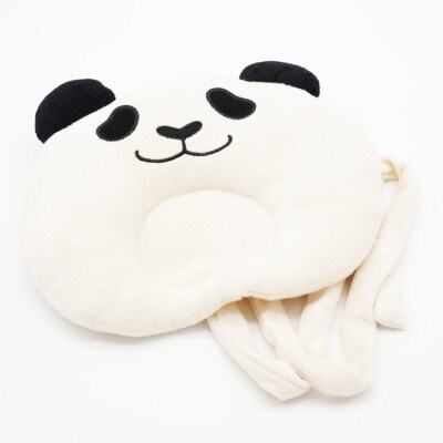 良浜がぎゅっと抱きしめるクッション